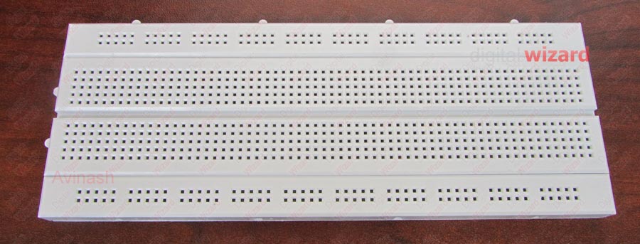 A standard size white breadboard